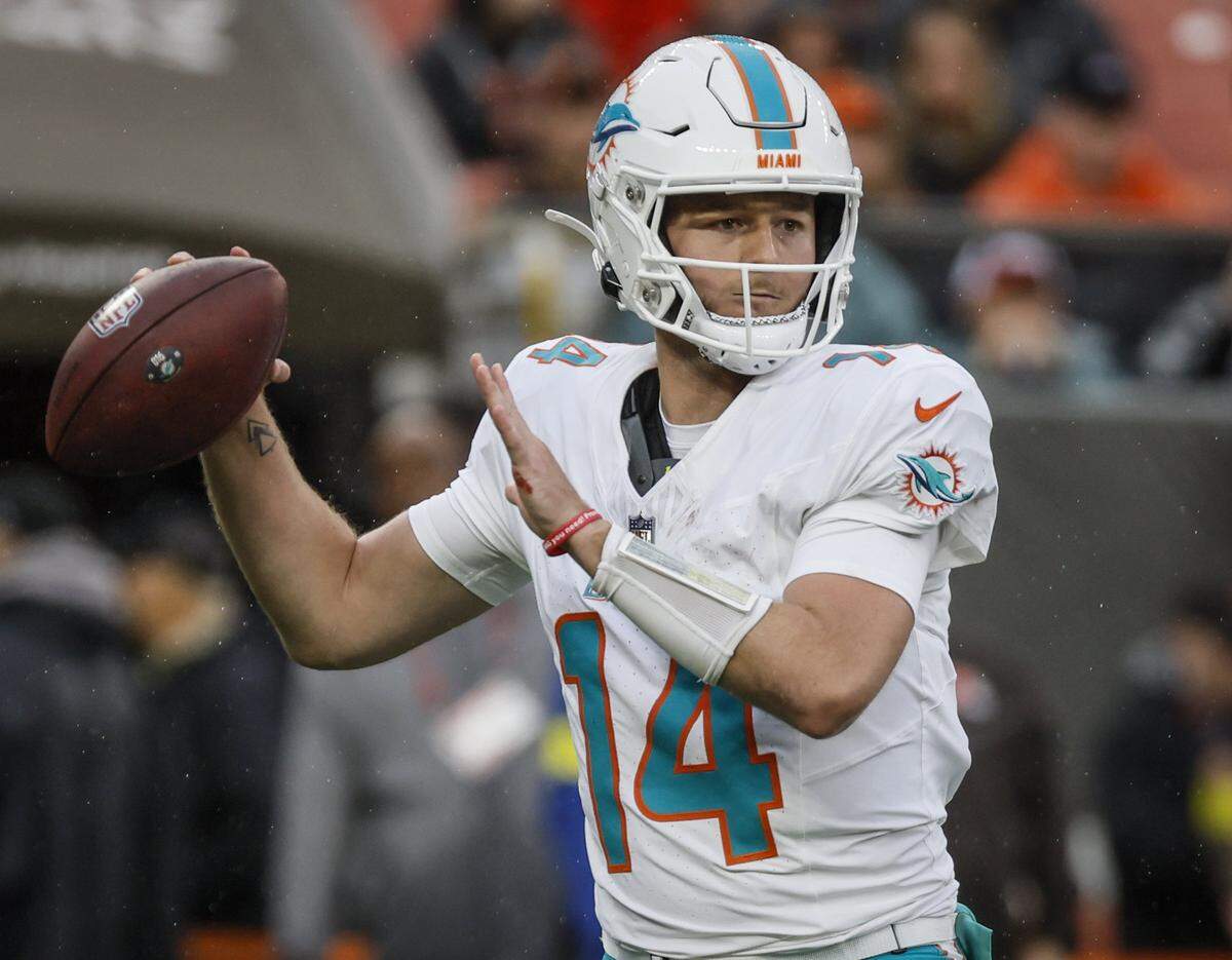 Miami Dolphins quarterback Quinn Ewers (14) sets up to pass during the second half of an NFL football game against the Cleveland Browns at Huntington Bank Field in Cleveland, Ohio, on Sunday, October 19, 2025.