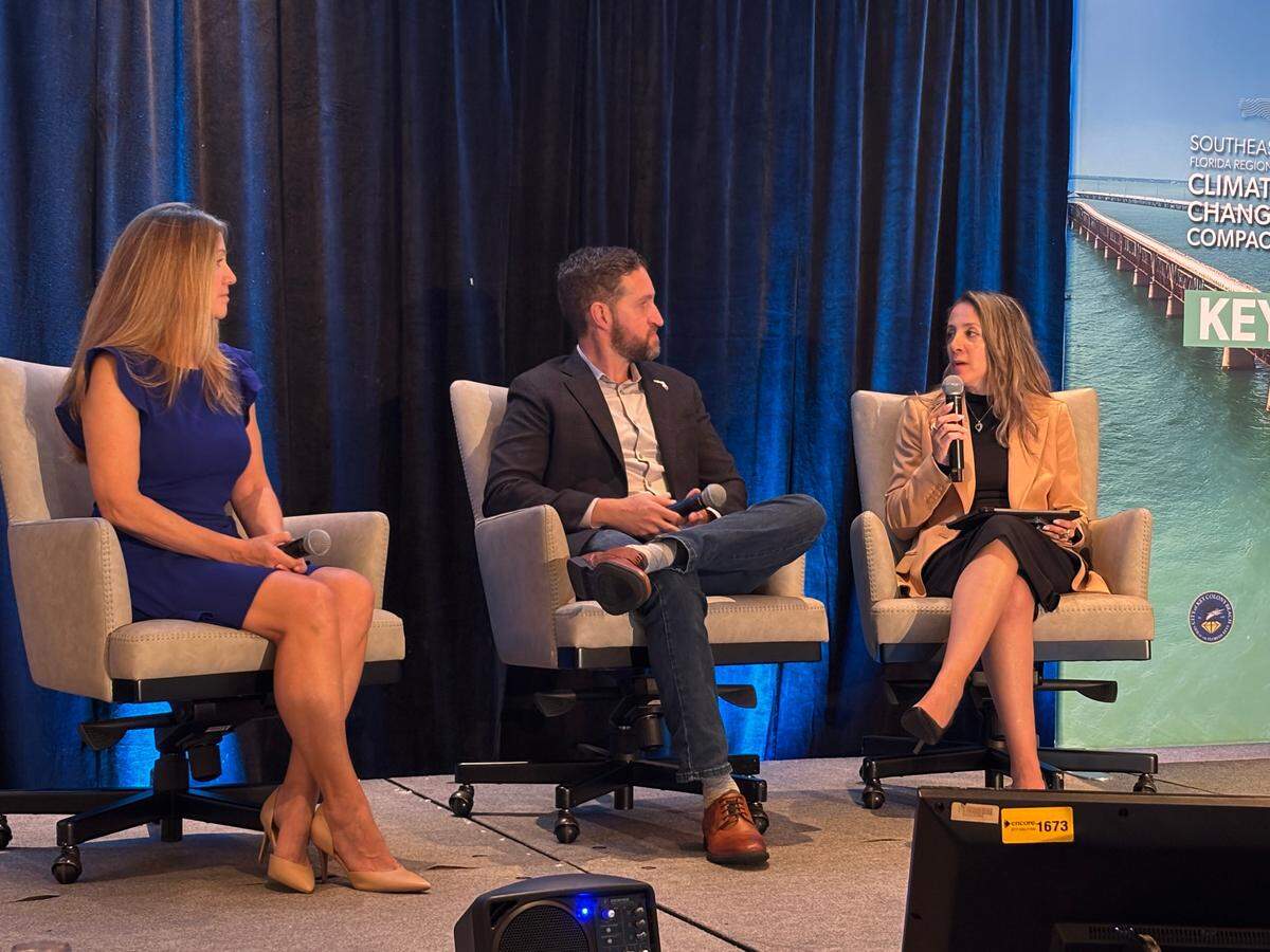 Alex Reed, Director of the FDEP’s Office of Resilience and Coastal Protection, and Wes Brooks, Florida’s chief resilience officer, speak with Patricia Gomez, Miami-Dade County’s chief resilience officer, on a panel at the Southeast Florida Climate Leadership Summit on December 17, 2024 in Key West.