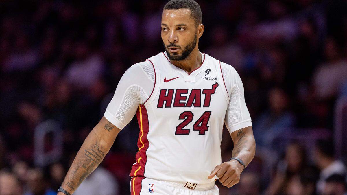Miami Heat guard Norman Powell (24) looks during an NBA preseason game against the Milwaukee Bucks at Kaseya Center on October  6, 2025, in Miami.
