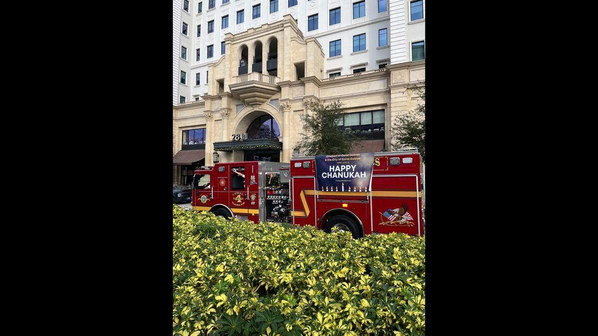 A Coral Gables Fire Department truck at Sunday’s public menorah lighting at Ponce Circle in the Gables, Sunday, Dec. 14, 2025.
