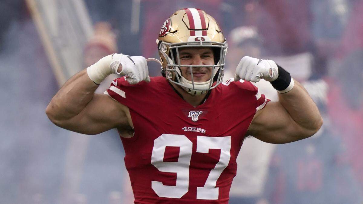San Francisco 49ers defensive end Nick Bosa (97) is introduced before the NFL NFC Championship football game against the Green Bay Packers Sunday, Jan. 19, 2020, in Santa Clara, Calif.