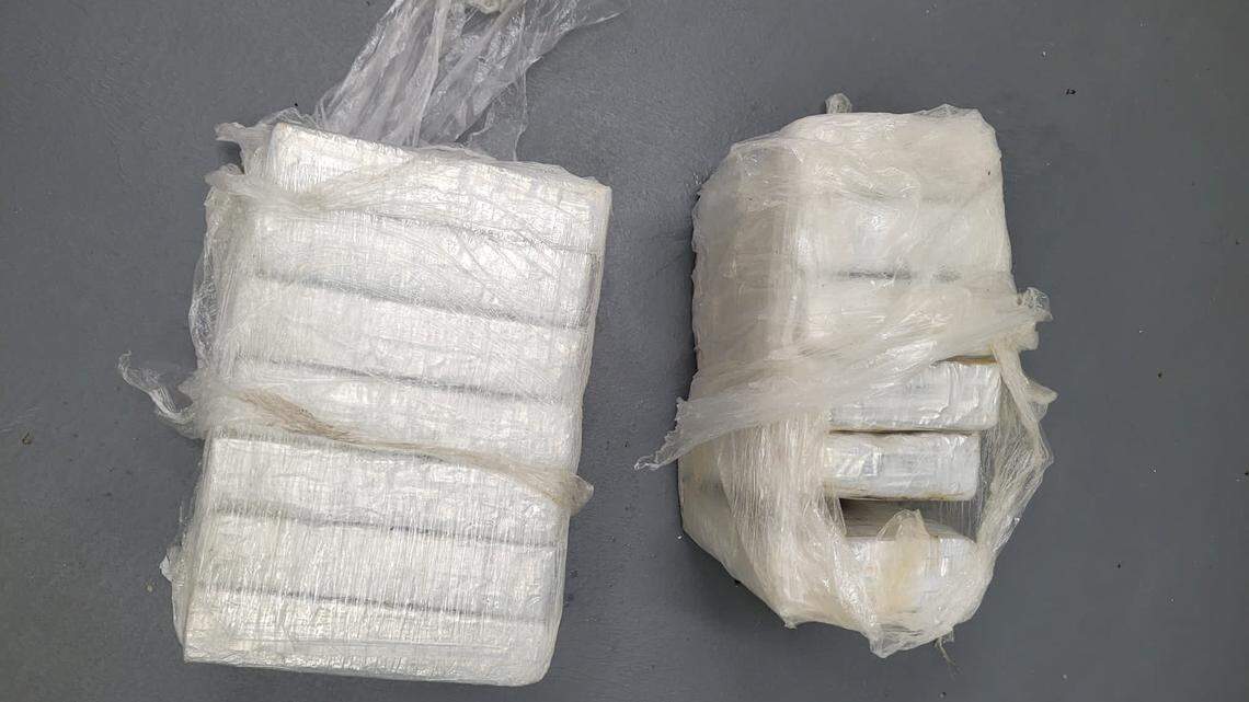 Bricks of cocaine are displayed on a table. The drugs were found by a boater in the Florida Keys Tuesday, May 2, 2023, and turned over to U.S. Border Patrol agents.