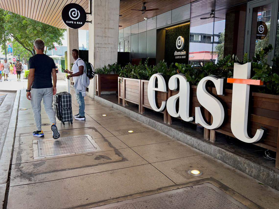 People walk passed the East Hotel on Monday, Sept. 4, 2023, in Brickell City Centre.