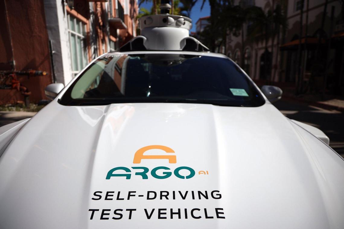 Experimental autonomous vehicle arrives on Espanola Way for a drop-off on Tuesday, December 8, 2020. Ford and its technology partner Argo AI are using their experimental autonomous vehicles to deliver school supplies and fresh greens to Miami Dade Schools families.