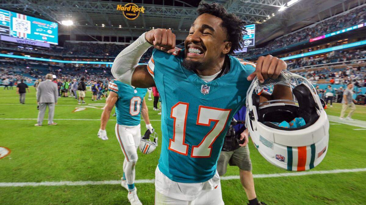 Miami Dolphins wide receiver Jaylen Waddle (17) celebrates after the Dolphins defeat the Dallas Cowboys at Hard Rock Stadium in Miami Gardens, Florida on Sunday, December 24, 2023.