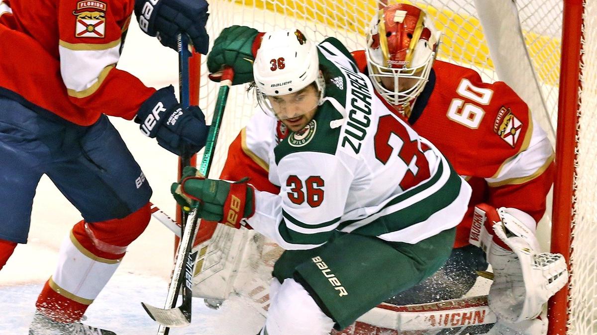 Florida Panthers goalie Chris Drieger (60) defends the net from Minnesota Wild Ryan Hartman (60) in the first period at the BB&T Center in Sunrise, Florida, Tuesday, December, 3, 2019.