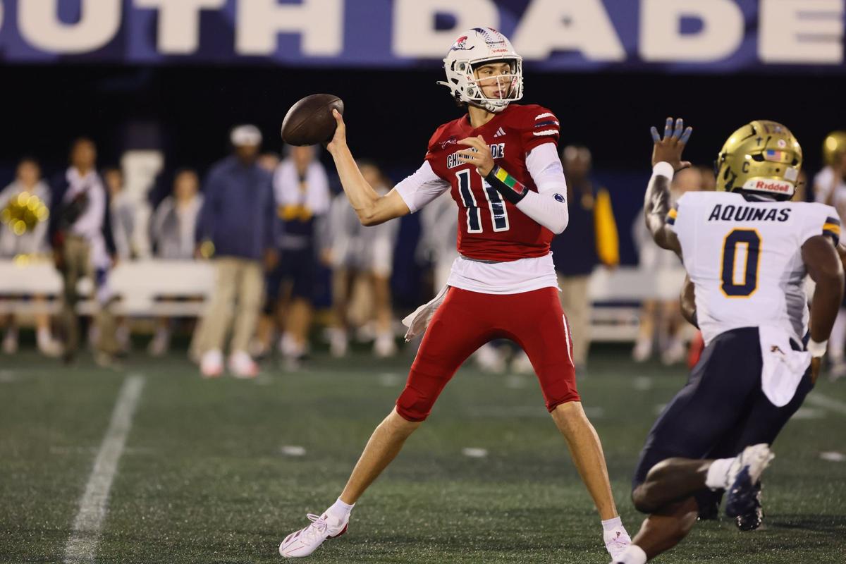 Chaminade-Madonna Lions quarterback Bekkem Kritza (11) throws the football against the St. Thomas Aquinas Raiders during the first quarter of a high school football game at Pitbull Stadium at Florida International University in Miami, Florida, Friday, October 11, 2024.