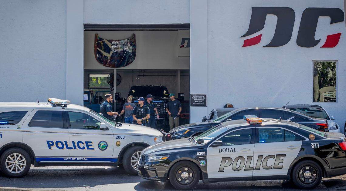Police and federal agents raid Doral Collision, on Friday, Aug. 16, 2024. The raid was in connection to the Aug. 27, 2019, plot to kill Alex Vega, a famed Miami car designer to the stars.
