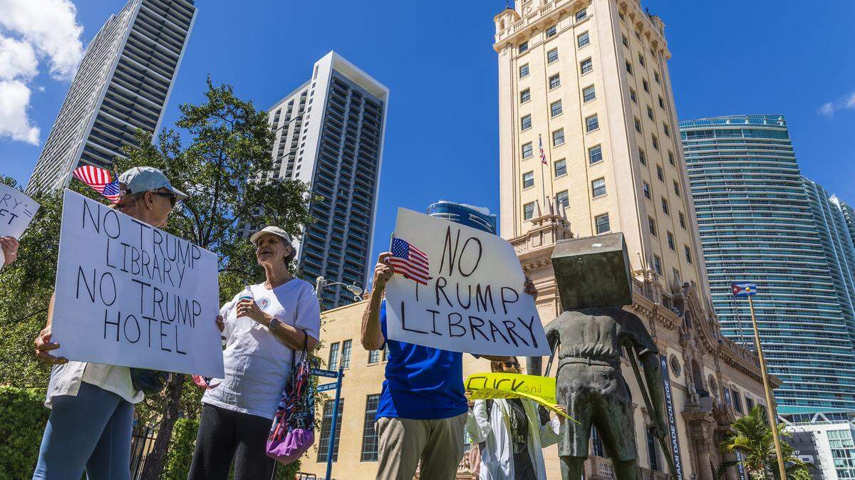 A group of people attended a protest next to the Freedom Tower, lead by Retired Prof. Marvin A Dunn against giving Miami Dade College property to be used for the Trump presidential library on Monday September 29, 2025.