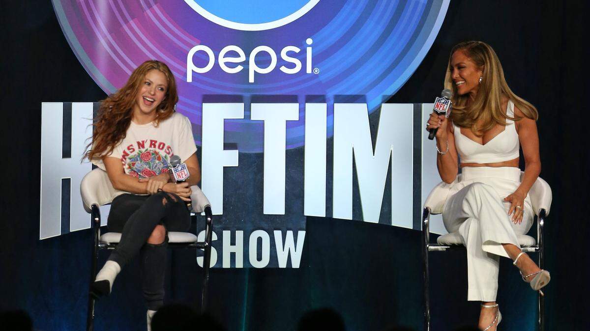 Jennifer Lopez and Shakira talk during press conference for the halftime show on Sunday during Super Bowl LIV at Hard Rock Stadium at Hilton Miami Downtown on Wednesday, January 30, 2020 in Miami.