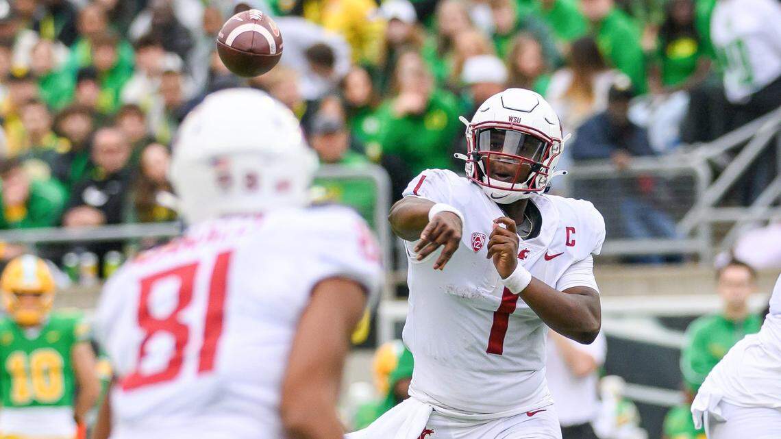 Oct 21, 2023; Eugene, Oregon, USA; Washington State Cougars quarterback Cameron Ward (1) Throws a pass to wide receiver Tsion Nunnally (81) in the 4th quarter against the Oregon Ducks at Autzen Stadium. Mandatory Credit: Craig Strobeck-USA TODAY Sports