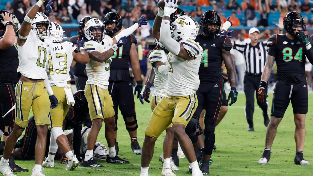 Georgia Tech Yellow Jackets defensive lineman Kyle Kennard (9) recovers the fumble by Miami Hurricanes running back Donald Chaney Jr. (2) late in the fourth quarter at Hard Rock Stadium in Miami Gardens on Saturday, October 7, 2023.