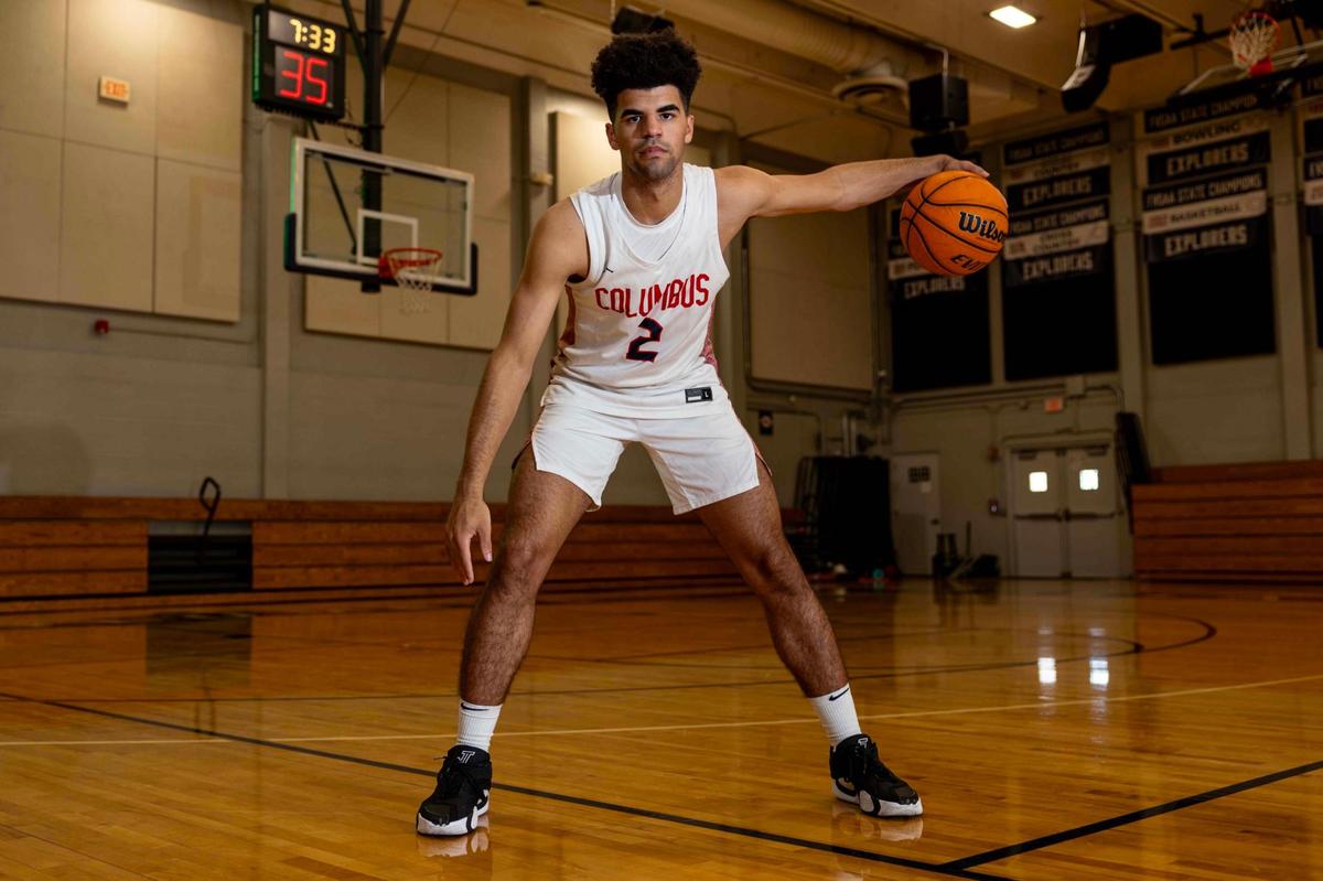Columbus basketball player Cayden Boozer (2) strikes a pose for a portrait at Christopher Columbus High School on Thursday, March 20, 2025, in Miami, Florida.
