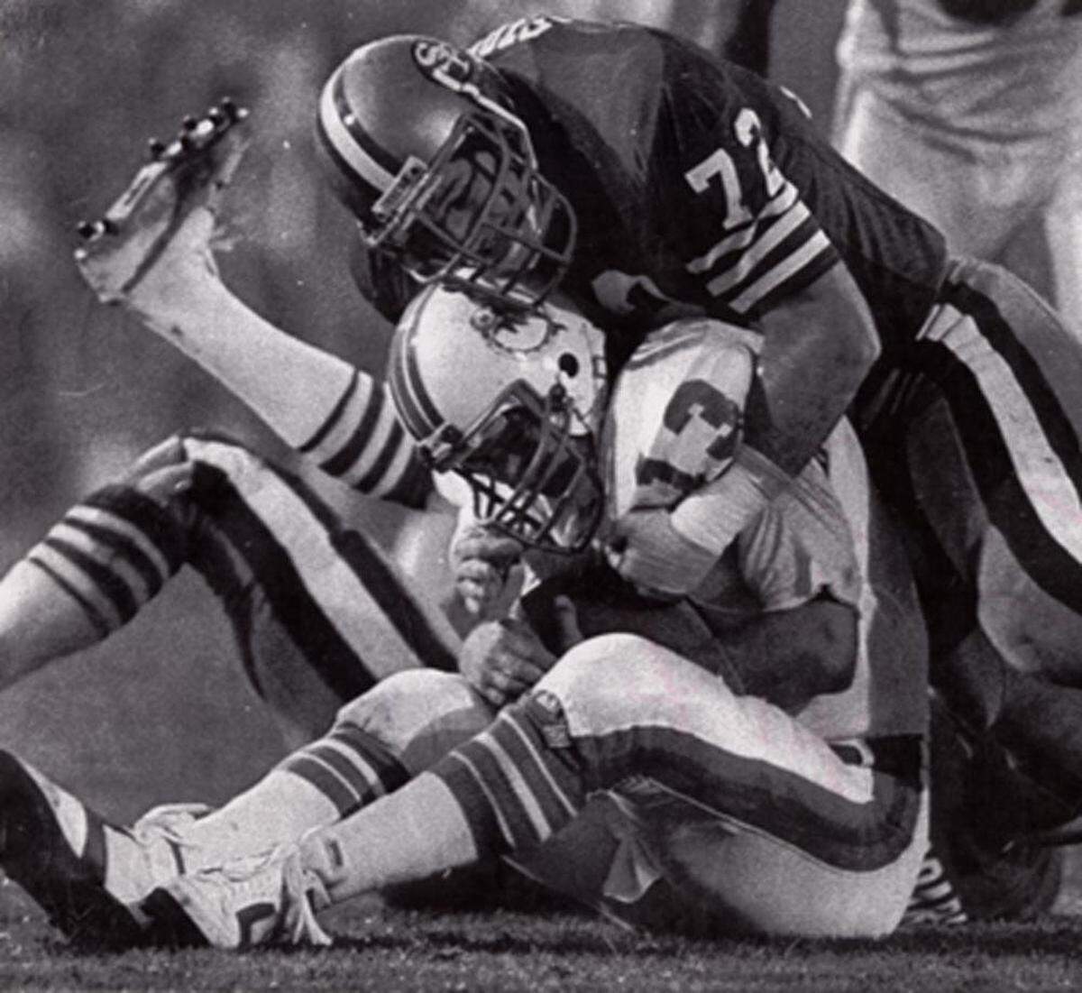 Dolphins quarterback Dan Marino is doubled over as he is sacked by San Francisco’s Jeff Stover during the 49ers 38-16 Super Bowl XIX win. The 49ers pass rush sacked the rarely-sacked Marino four times.