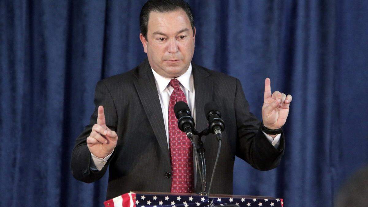 Jeremy Ring, Democratic nominee for chief financial officer, talks to supporters during a rally held in Orlando.