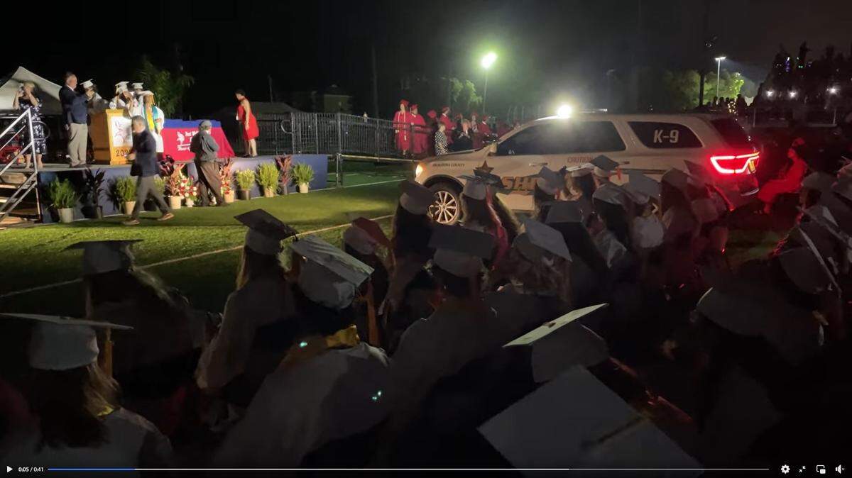 Deputies from the Okaloosa Sheriff’s Office rolled onto the field at Steve Riggs Stadium on May 25, 2022, in SUVs and flooded the stadium with spotlights so that the Fort Walton High School graduation ceremonies could continue after a nearby transformer blew out.