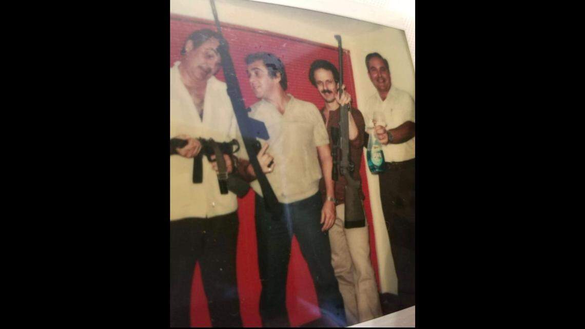 Ricardo Morales, known as “Monkey,” second left, and his “cleanup” crew posing with CIA-provided sniper rifles. The date and the location of the photo are not known.