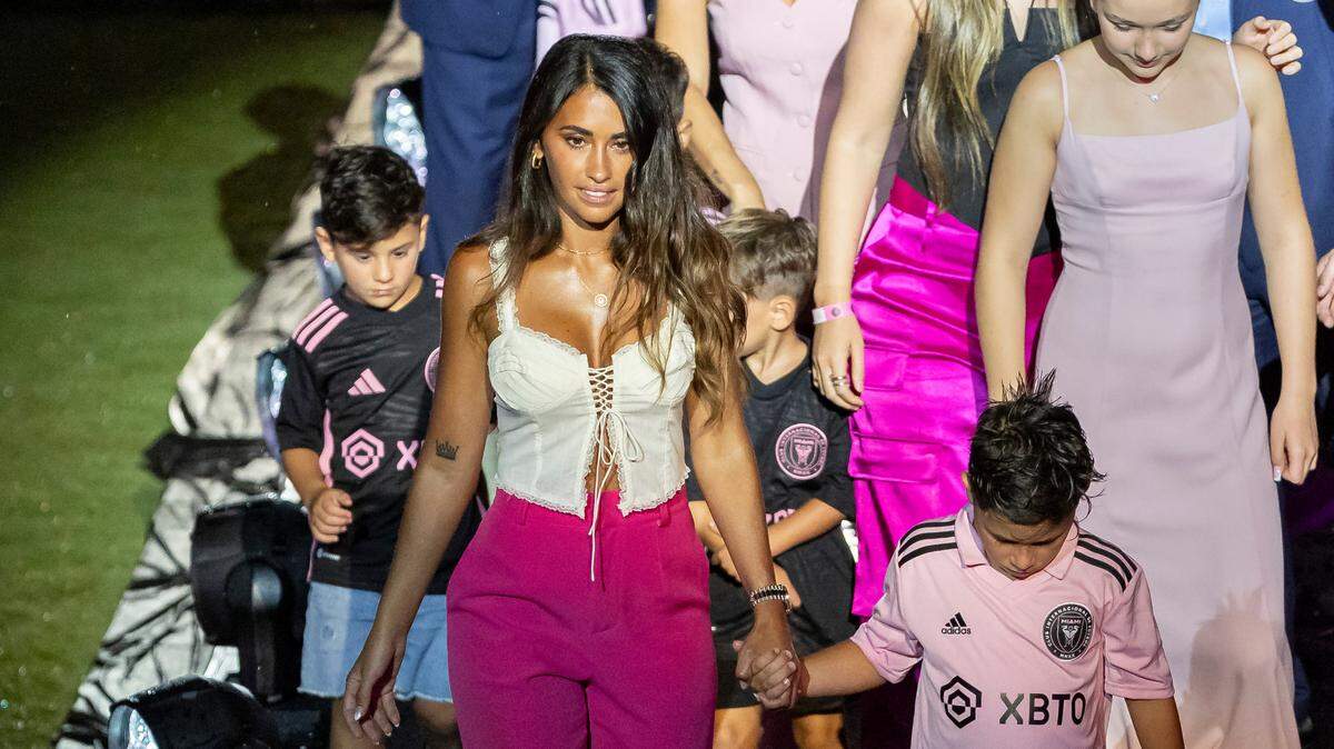Lionel Messi’s wife, Antonela Roccuzzo, and sons, Thiago, Mateo and Ciro walk off the stage during Inter Miami’s The Unveil event at DRV PNK Stadium on Sunday, July 16, 2023, in Fort Lauderdale, Fla. The event was held to officially welcome Argentine forward Lionel Messi (10) and Spanish midfielder Sergio Busquets (5) to the team.