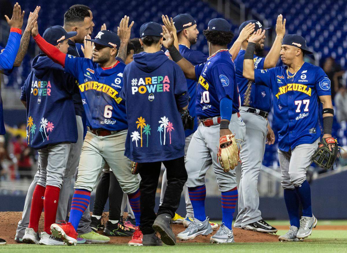 Venezuela players celebrate after defeating Mexico in their Caribbean Series baseball game at loanDepot park on Monday, Feb. 5, 2024, in Miami, Fla.