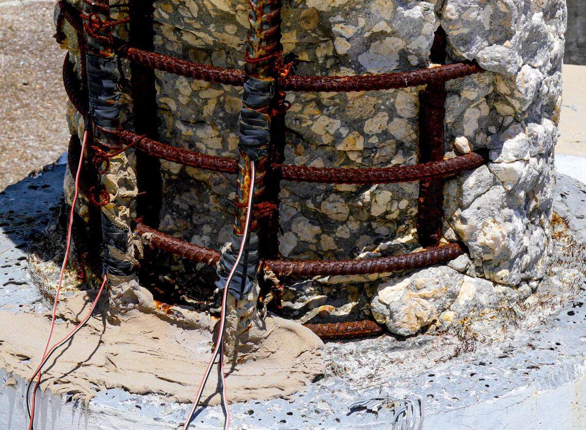 Exposed rebar and concrete sits outside the Structures Lab during an experiment to measure the deterioration of metals, known as corrosion, alongside an Ultra High performance concrete, at the College of Engineering & Computing in Miami on Aug. 10, 2021. UHPC, as the researchers call it, is far stronger than regular concrete, but the real benefit is how flexible it is. Concrete that can bend without breaking makes stronger, safer bridges and condos.