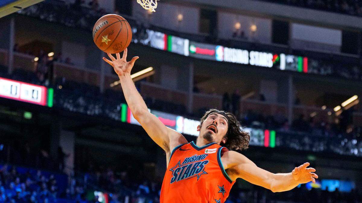 Team T guard Jamie Jaquez Jr. (11) of the Miami Heat goes for the basket during the 2025 NBA Rising Stars Game at Chase Center.
