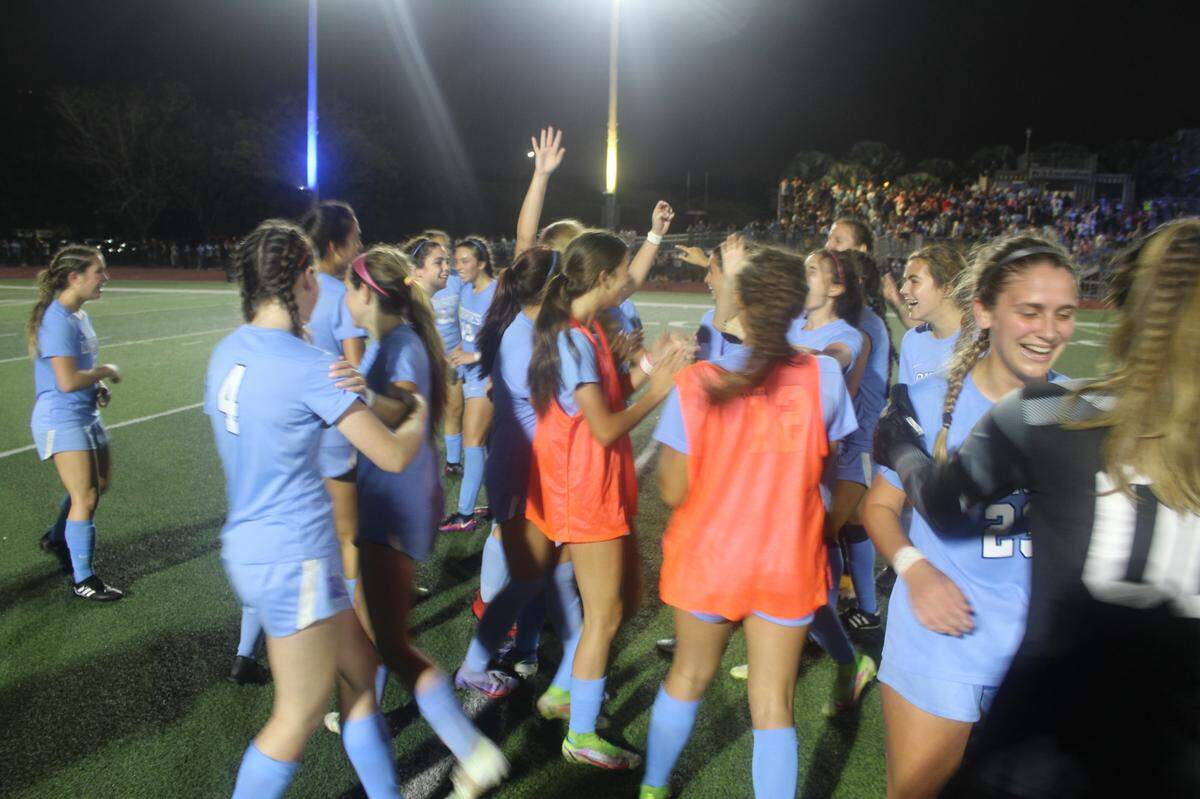 The Lourdes girls soccer team celebrates its fourth trip to the state championship game in the past five seasons after beating Land ‘O Lakes 2-1 on Friday night in the Class 7A state semifinals at Belen Jesuit.