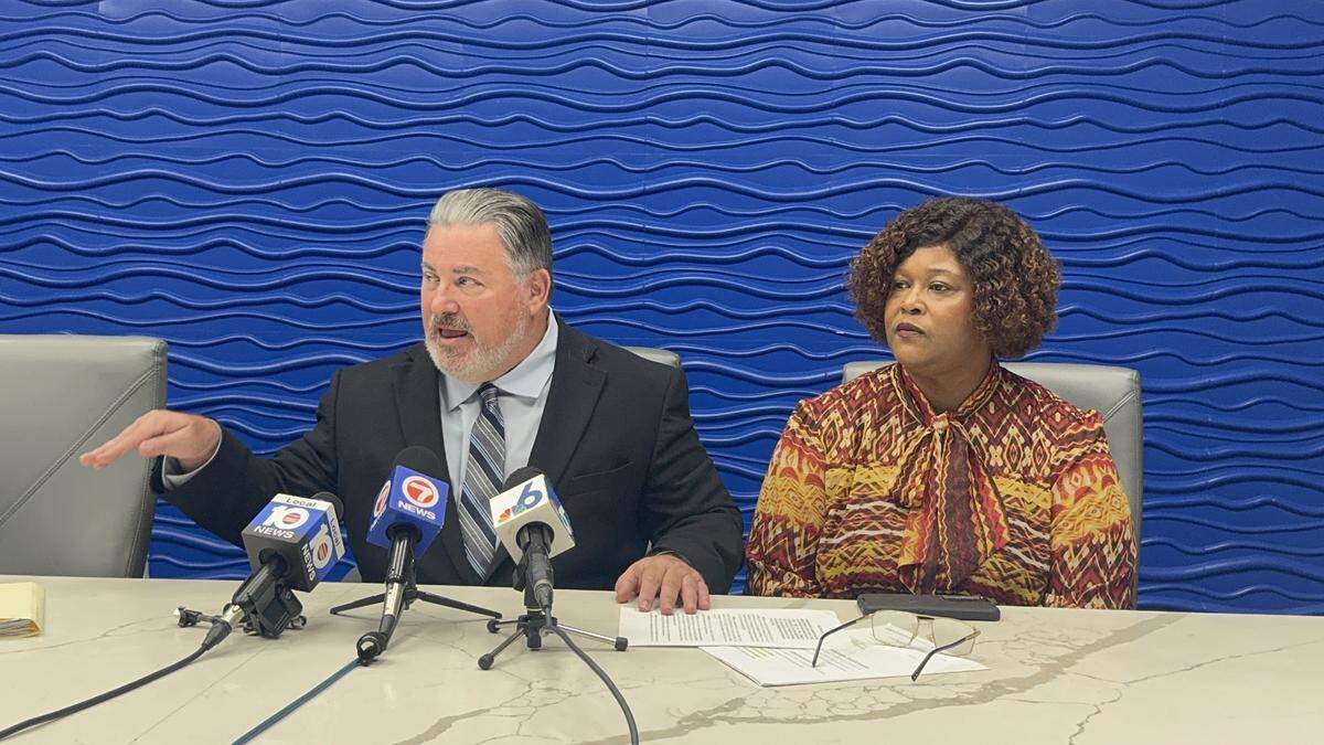 Attorney Michael Pizzi and West Park City Commissioner Katrina Touchstone address the media at a press conference on Aug. 22. in Miami Lakes. Touchstone is suing the City of West Park, the mayor, the city clerk and the city manager over alleged misconduct at commission meetings.