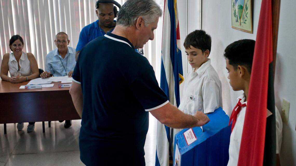 Cuban leader Miguel Díaz-Canel votes during a referendum Sunday to approve or reject a new constitution. The constitutional reforms maintain Cuba’s single-party political system and centrally planned economy while recognizing private property.