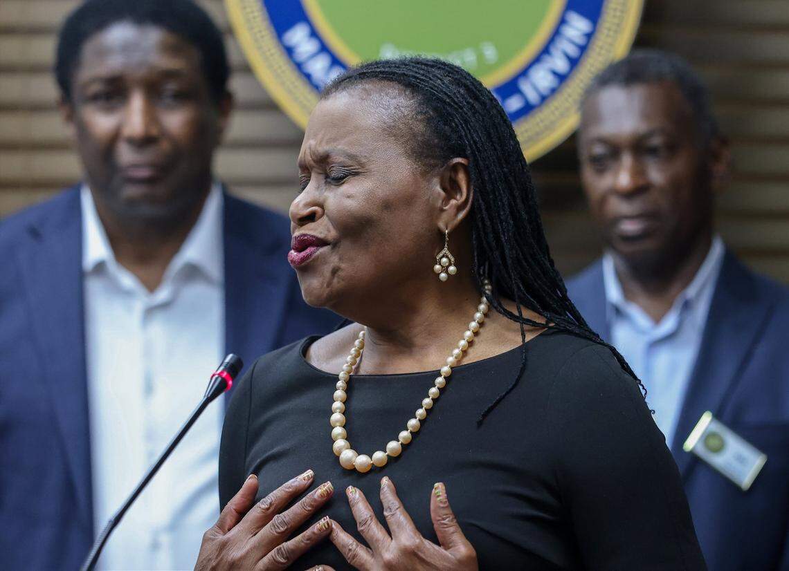 Miami-Dade Commissioner Marleine Bastien speaks Monday about Haitians who are at risk of losing the righ to live and work in the United States.