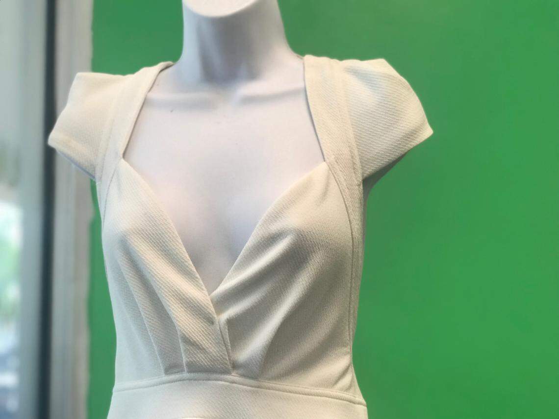 Gina Duran has hung Alexa's short white dress at the entrance of Unicorn Cleaners, a constant reminder of the daughter she lost March 15 in the FIU bridge collapse.