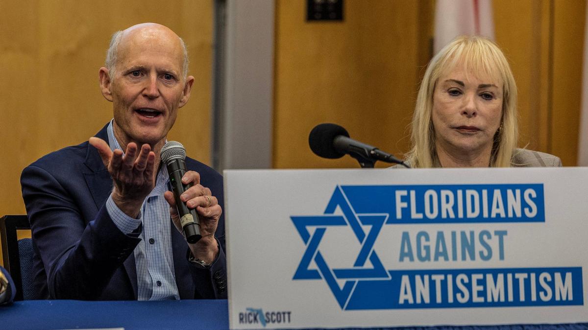 Barbara Feingold listens as Florida U.S. Sen. Rick Scott speaks during the Floridians Against Anti-Semitism roundtable event at Florida International University, in Miami, on Sept. 20, 2024.