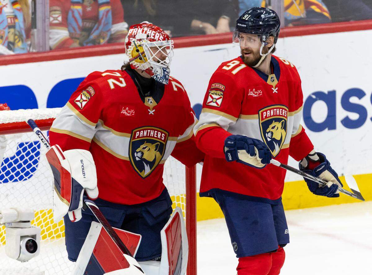 Florida Panthers defenseman Oliver Ekman-Larsson (91) talks with teammate Sergei Bobrovsky (72) after a play against the New York Rangers in the second period of Game 6 during the Eastern Conference finals of the NHL hockey Stanley Cup playoffs at the Amerant Bank Arena on Saturday, June 1, 2024, in Sunrise, Fla.