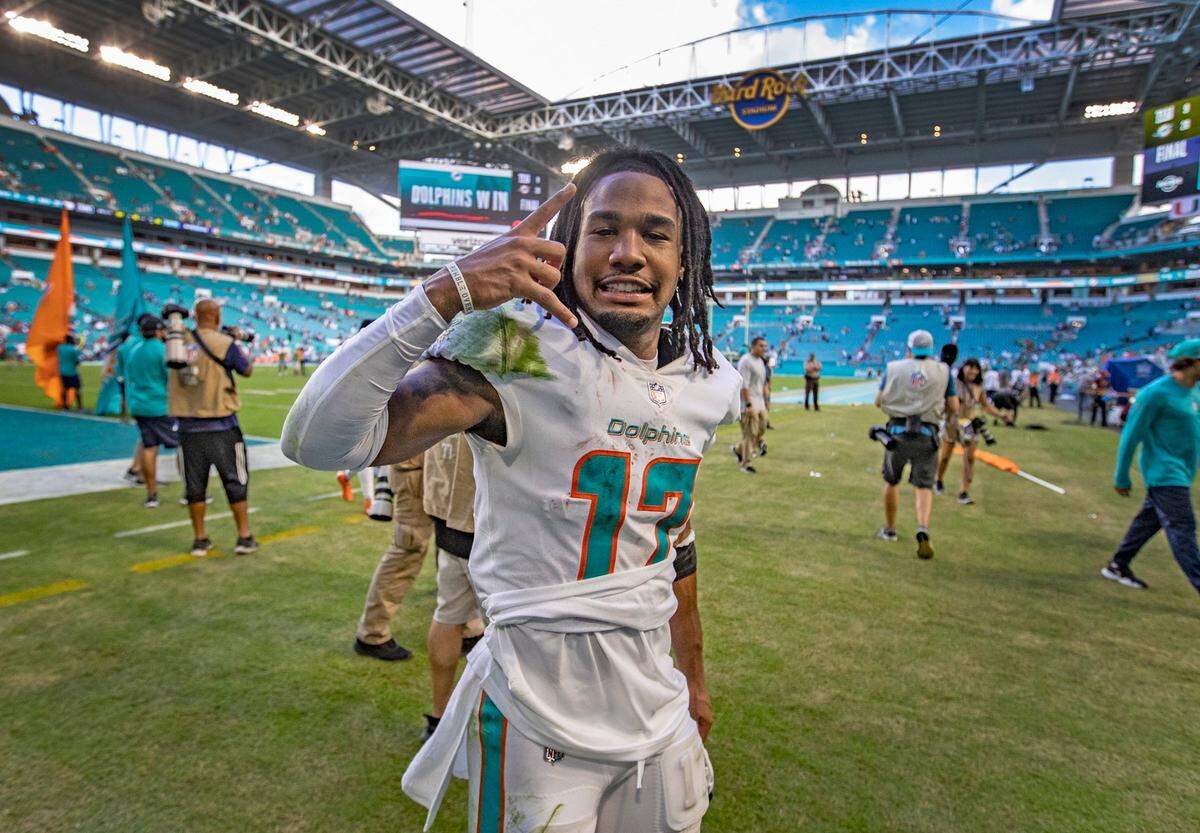 Miami Dolphins wide receiver Jaylen Waddle (17) celebrates after the Dolphins defeat the New York Giants at Hard Rock Stadium in Miami Gardens on Sunday, December 05, 2021. ( Al Diaz Photo / Miami Herald )