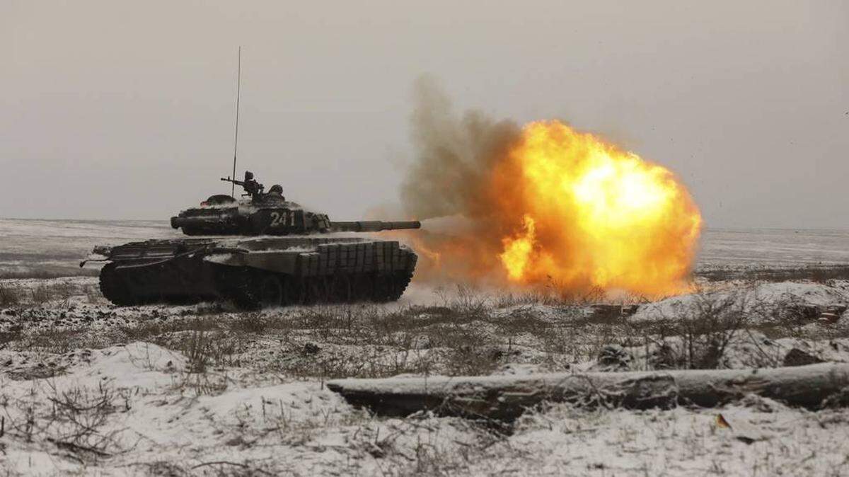 A Russian tank fires as troops take part in drills at the Kadamovskiy firing range in the Rostov region in southern Russia in January.