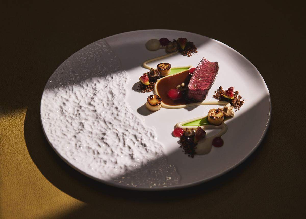 Venison tenderloin with confit celeriac, hearts of palm puree, toasted pine nut and Adriatic fig jus.