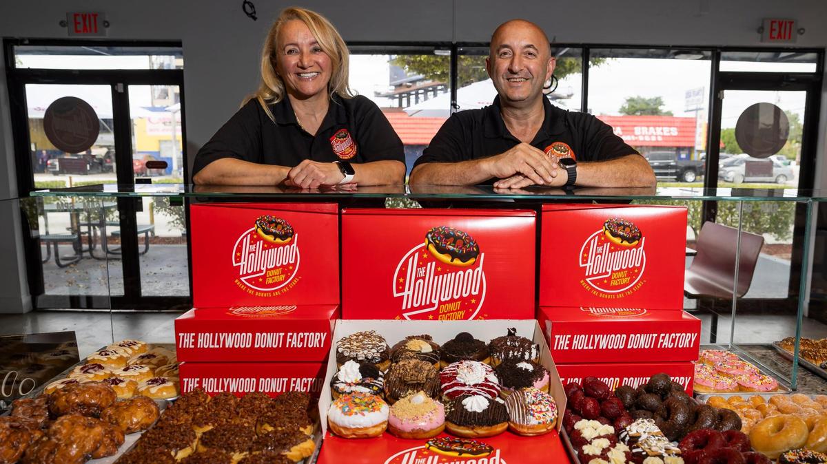 Hollywood Donut Factory owners Kat Palushaj and her brother Bobby Palushaj inside their new store on Bird Road near Southwest 89th Avenue.