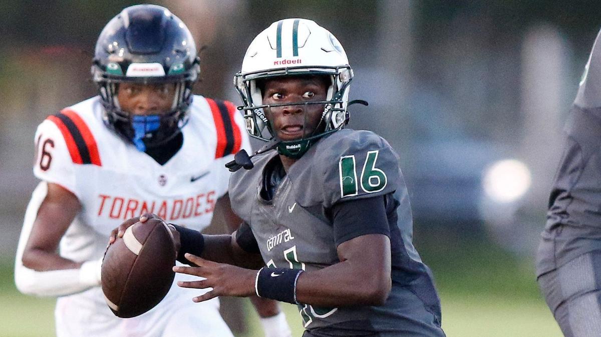 Miami Central Rockets quarterback Anthony McQueen (16) looks to pass against Booker T. Washington Tornadoes during football game on Saturday, September 7, 2024 at Traz Powell Stadium in Miami.