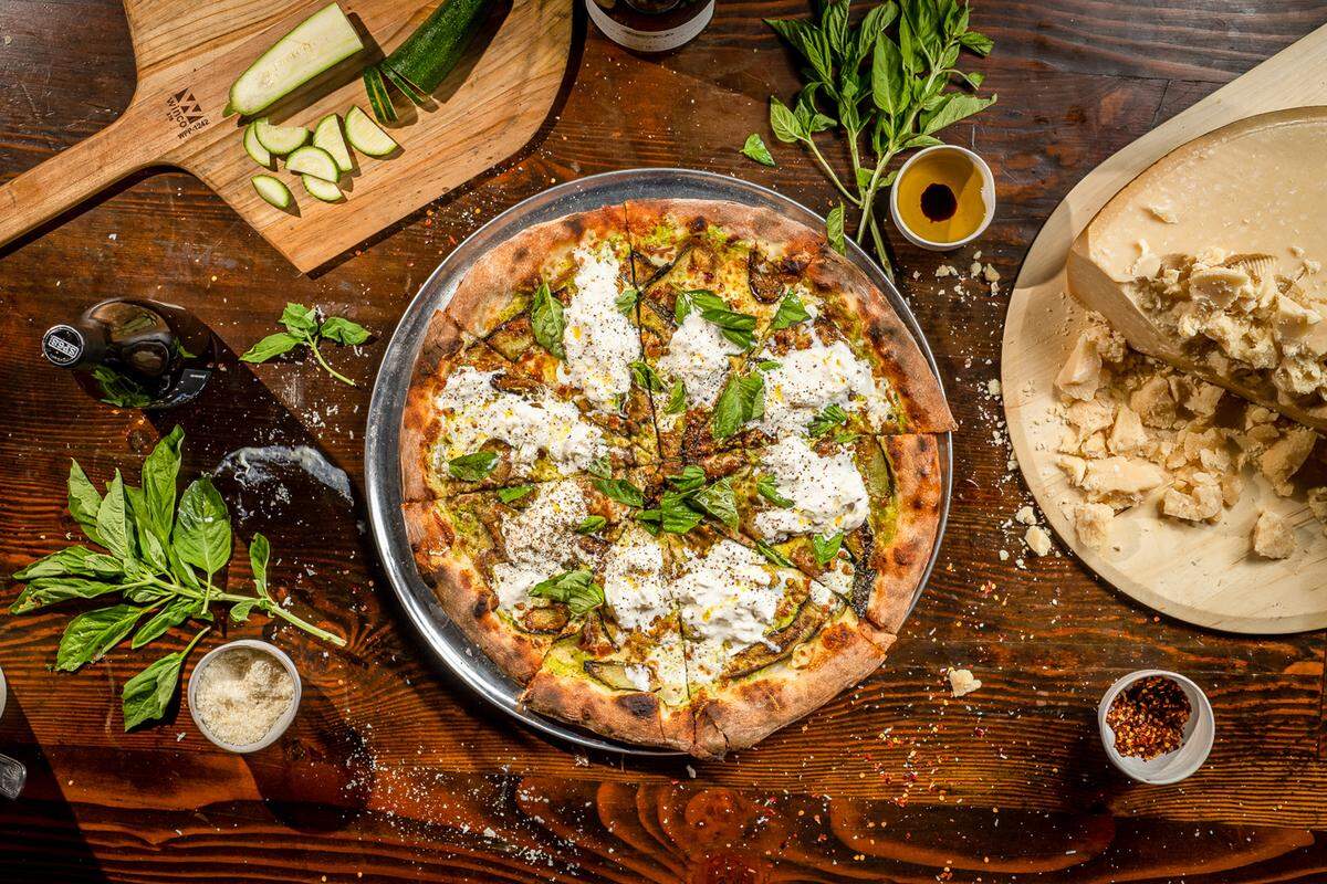 The Nerano at Eleventh Street Pizza uses local roasted zucchini,&nbsp; pistachio caciocavallo cheese, mozzarella. and fresh homemade stracciatella. 