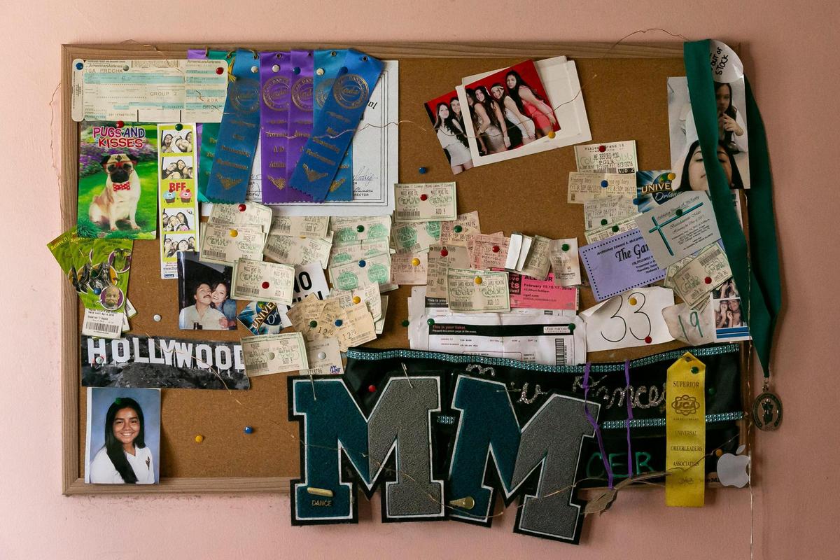 A board filled with memorial items like movie tickets, photos and awards is on display inside Alexa Duran’s room at her home in Miami, Florida, on Tuesday, Jan. 4, 2022. Duran, 18, was driving her father’s car the day the FIU bridge collapsed. She was one of six people who died that day.