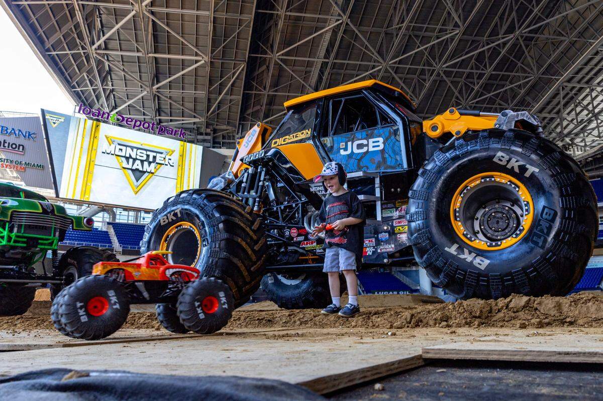 Boca Raton native Slade Harfmann, 3, plays with a remote control monster truck during Monster Jam media day at LoanDepot Park in Miami, Florida on Thursday, February 22, 2024.