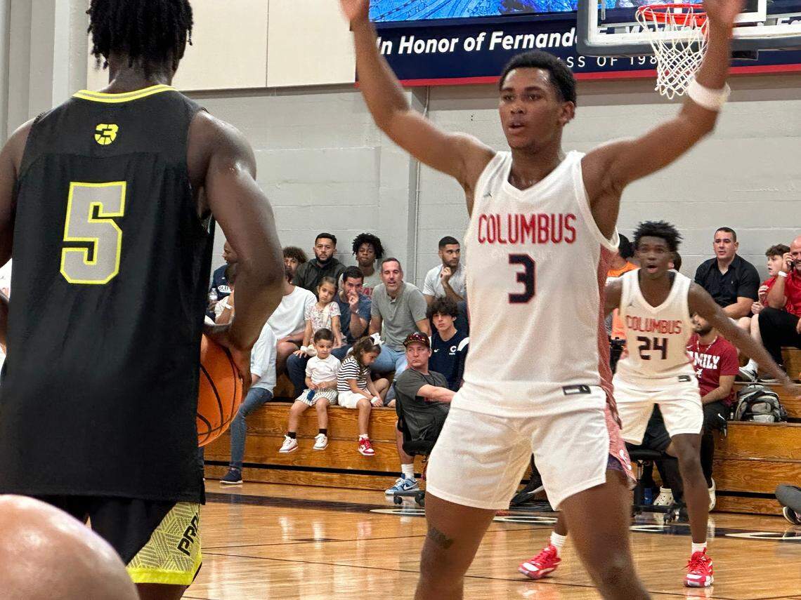 Columbus’ Randy Smith (3) defends Prolific Prep’s Zoom Diallo (5) during Wednesday night’s matchup of nationally-ranked high school basketball teams at the Explorers’ gym.