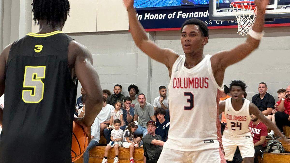 Columbus’ Randy Smith (3) defends Prolific Prep’s Zoom Diallo (5) during Wednesday night’s matchup of nationally-ranked high school basketball teams at the Explorers’ gym.