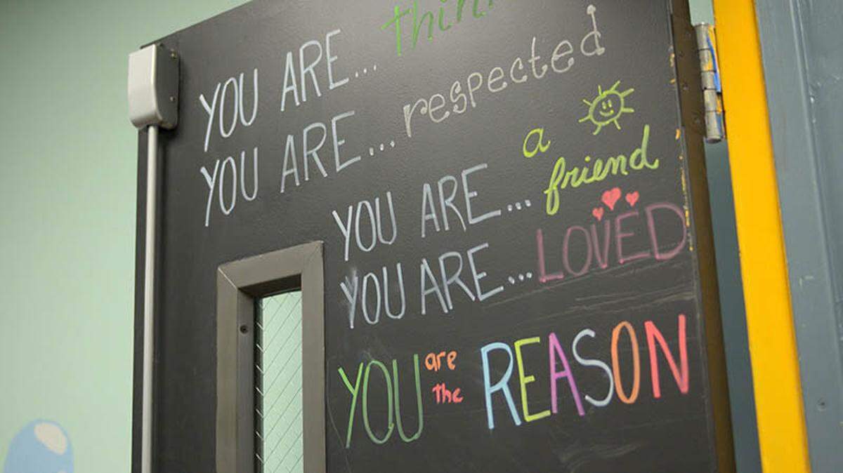 Positive messages adorn the doors at Early Beginnings Academy in Miami, a charter school that enrolls some of the most medically fragile children in Miami-Dade County.