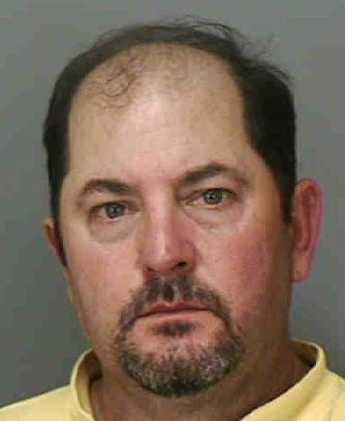 Baxter Troutman’s mugshot after his 2012 arrest on a battery charge.