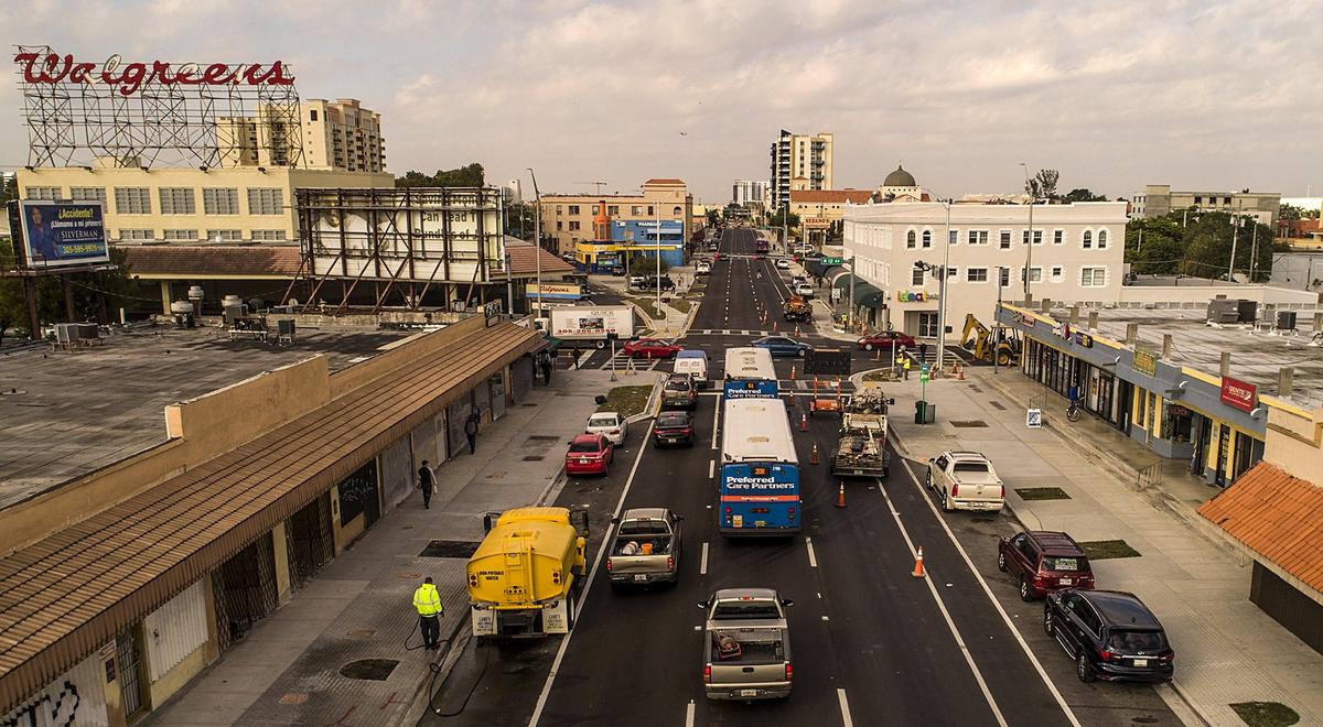 At the intersection of Flagler Street and 12th Avenue on Tuesday, construction crews put the last touches on road work that took 2 1/2 years.