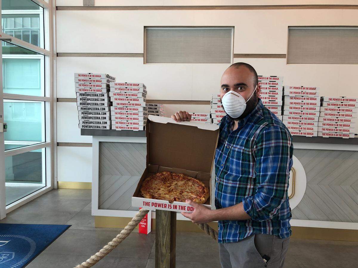 Neology Life, the development and property management firm behind Pier 19, ordered a large pizza from Power Pizza pictured above for each resident.