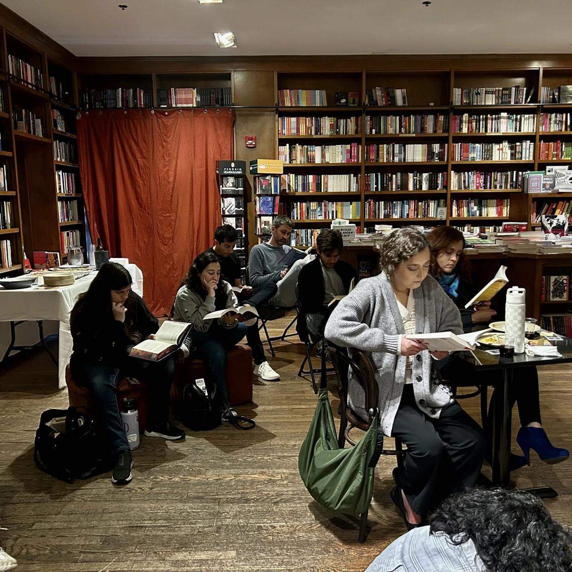 Participants read silently at Books & Books in Coral Gables.