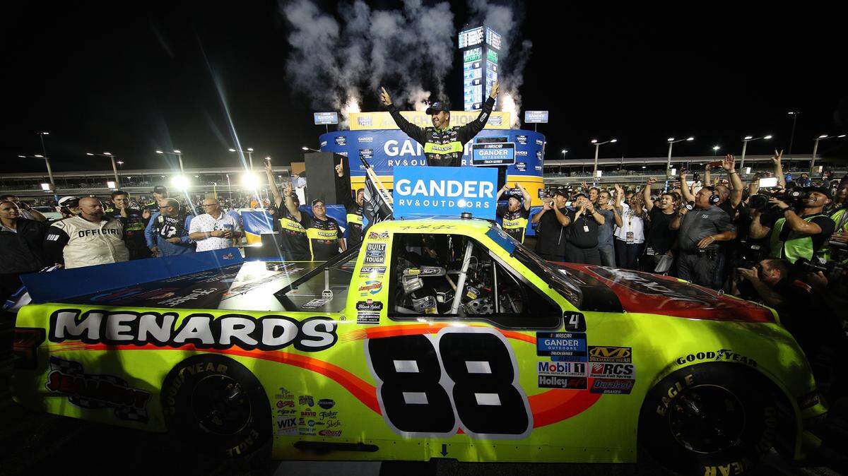 HOMESTEAD, FLORIDA - NOVEMBER 15: Matt Crafton, driver of the #88 Jack Links/Menards Ford, celebrates winning the NASCAR Gander Outdoors Truck Series Championship at Homestead-Miami Speedway on November 15, 2019 in Homestead, Florida. (Photo by Chris Graythen/Getty Images)