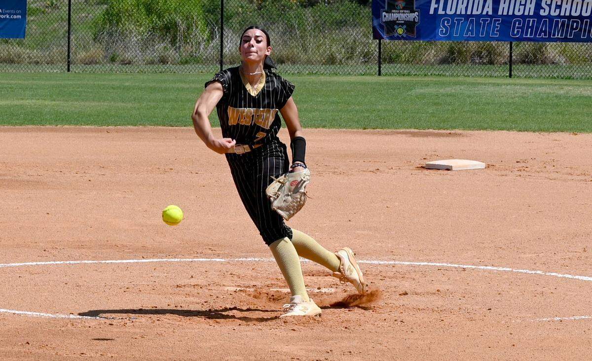 Western right-handed pitcher Ali Solo whips a little spin on the ball while delivering a pitch during the second inning of the FHSAA Class 7A state championship game on Saturday at Legends Way Ballfields in Clermont, Fla.