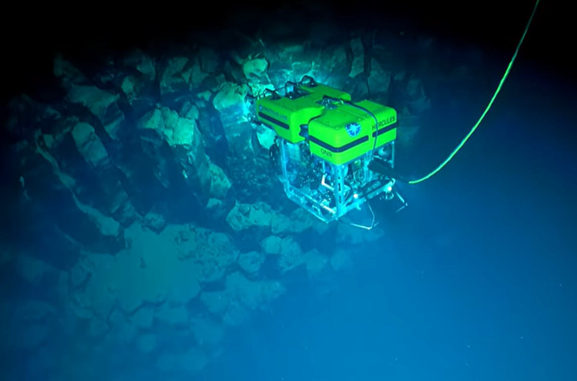ROV Hercules captured this footage of stunning deep sea columnar basalt while diving on ancient volcanos around 1,700 meters deep in a canyon North of Molokai. Basalt is an igneous rock that, as lava, cools in a particular way that creates these unique hexagonal columns.